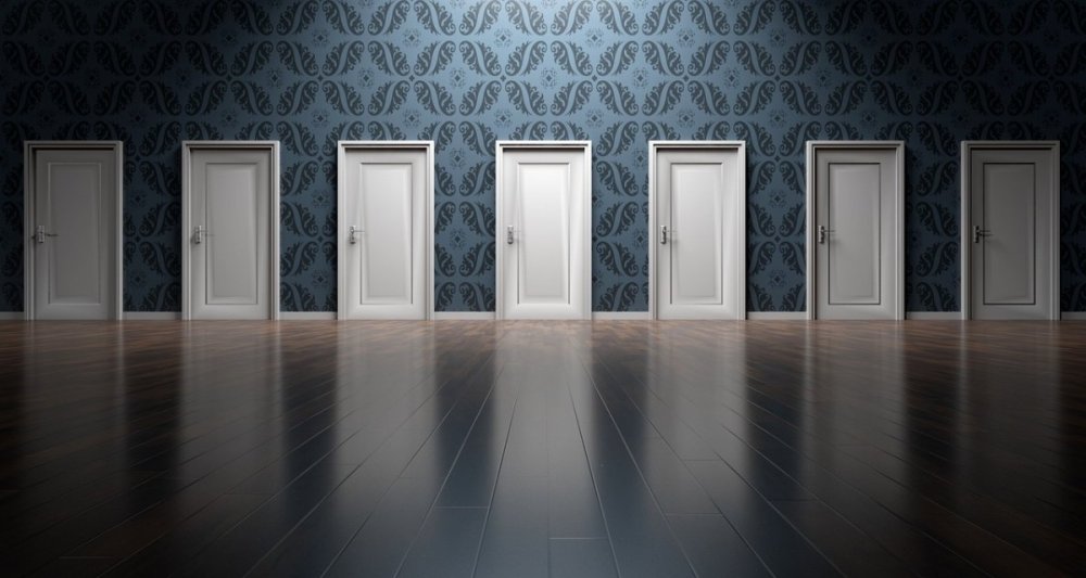 a room full of doors symbolising that there are multiple paths to take for a founder.