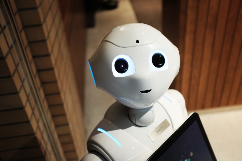 AI robots taking over jobs and ruining recruitment efficiency.